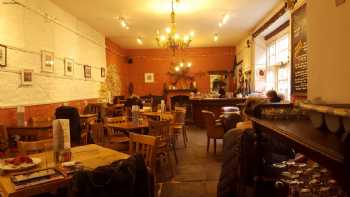 The Snug Restaurant & WOOD-FIRED PIZZERIA