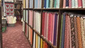 Claus' En Paus Quilt Shoppe